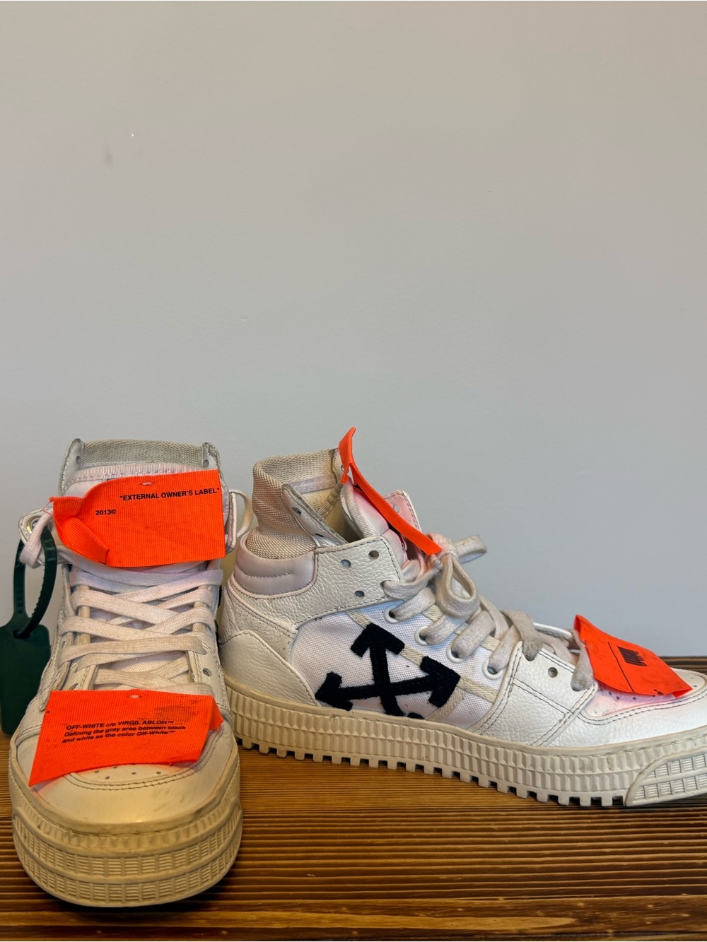 Off-White White High-Top Sneakers with Black Arrow Motif and Orange Tags size 7